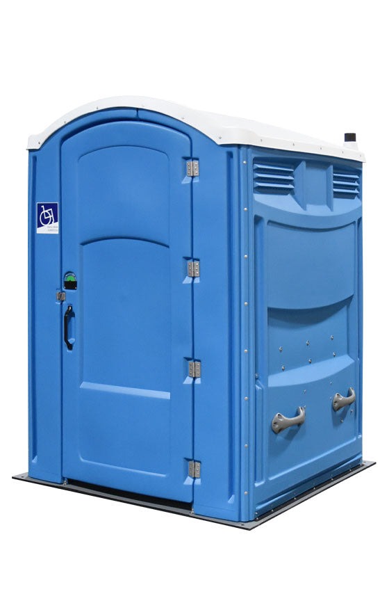 An ADA handicap potty rental at an outdoor event venue, providing accessibility and comfort to all attendees.